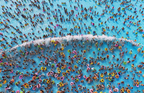 People cool off at a water park, in Nanjing, Jiangsu province, August 1, 2015. Temperature hit 35 degrees Celsius (95 degrees Fahrenheit) in Nanjing on Saturday. Picture taken August 1, 2015. REUTERS/China Daily CHINA OUT. NO COMMERCIAL OR EDITORIAL SALES IN CHINA TPX IMAGES OF THE DAY - RTX1MQ3Y