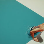 Three photorealistic artists working with oil